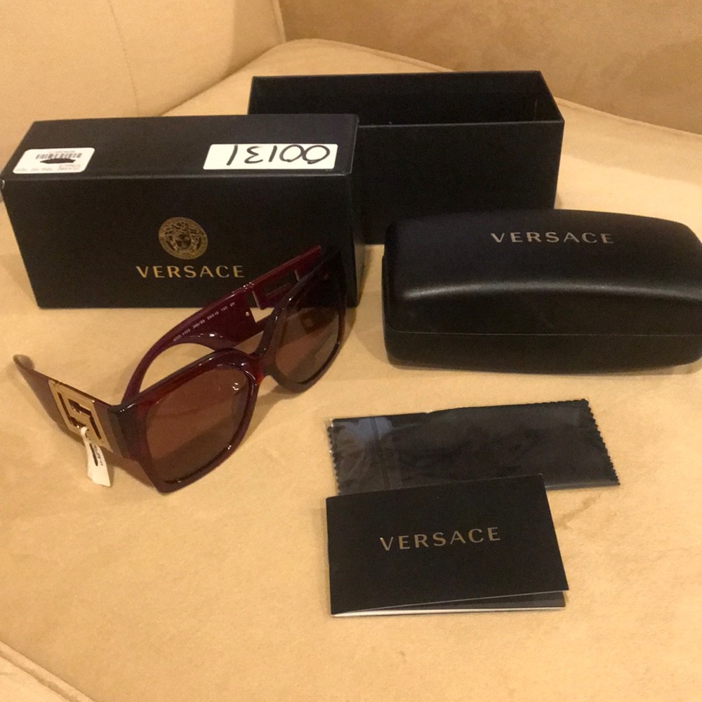 NEW w/ Box Versace Sunglasses with Dark Violet lenses and Transparent Red frame